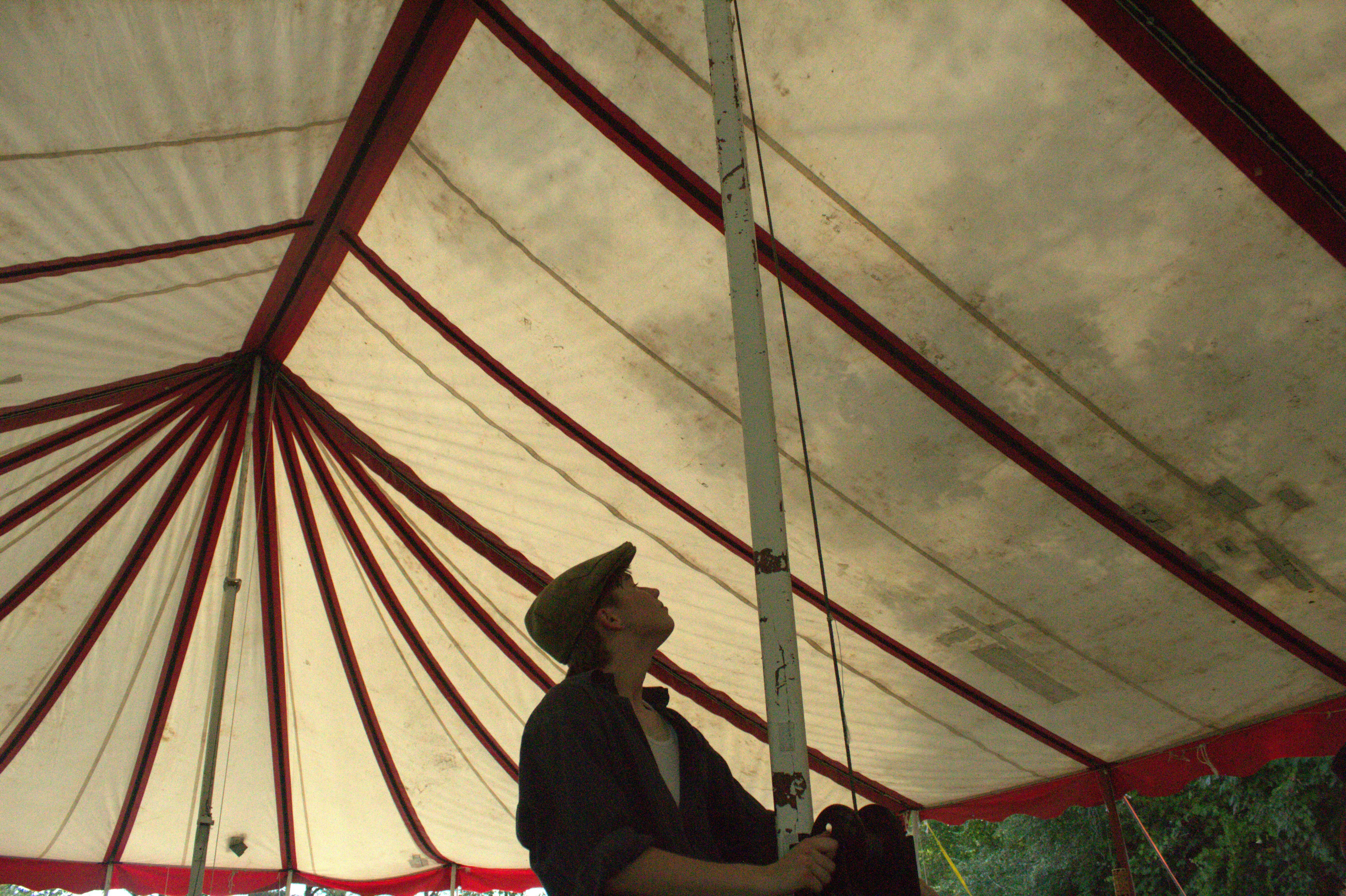 Looking up at the big top's canvas ceiling from inside the Kuroneko Circus tent